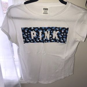 White t shirt with floral logo